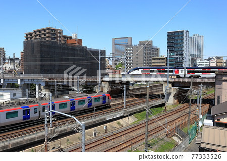 Overpassing railroad tracks Senjusekiyacho 77333526