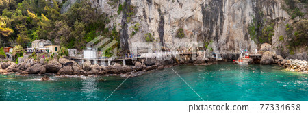 beautiful rocky berth of Punta Chiappa near Portofino in Liguria with sea walkway horizontal italy beautiful rocky berth of Punta Chiappa near Portofino in Liguria with sea walkway horizontal italy 77334658