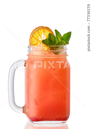 Cold orange and cherry lemonade in mason jar isolated on white Cold orange and cherry lemonade in mason jar isolated on white 77336259