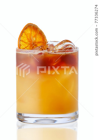 Cold refreshing tea with raspberries and orange isolated on white Cold refreshing tea with raspberries and orange isolated on white 77336274