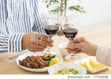 Evening drink wine with a couple Evening drink wine with a couple 77336886