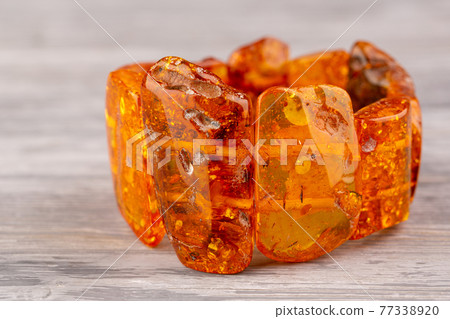Bracelet of whole pieces of honey amber. Each element is turned and polished into manual Bracelet of whole pieces of honey amber. Each element is turned and polished into manual 77338920