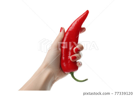 Female hand hold chili pepper, isolated on white background 77339120