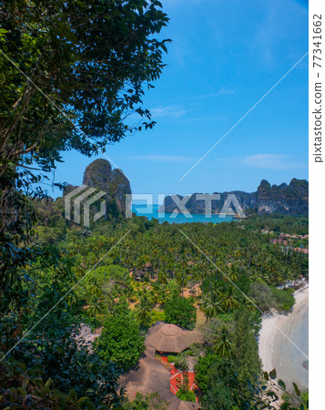 View of the east and west beaches of the island from the observatory (Railay, Krabi, Kingdom of Thailand) View of the east and west beaches of the island from the observatory (Railay, Krabi, Kingdom of Thailand) 77341662