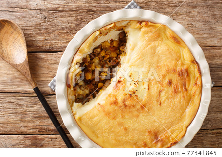 Shepherd's Pie French Canadian Pate Chinois closeup in the baking dish. Horizontal top view 77341845
