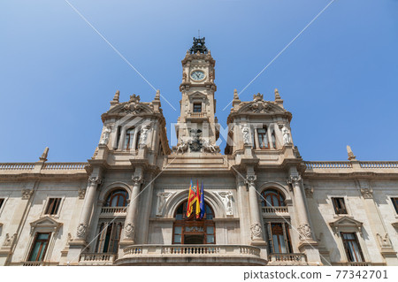 Valencia City Hall (Plaza del Ayuntamiento) facade against blue sky. Valencia, Spain Valencia City Hall (Plaza del Ayuntamiento) facade against blue sky. Valencia, Spain 77342701