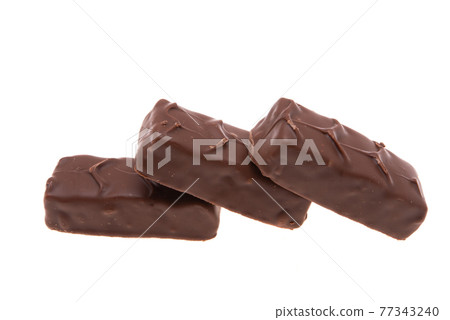 chocolate bar with nuts and caramel isolated 77343240
