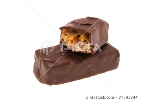 chocolate bar with nuts and caramel isolated 77343244