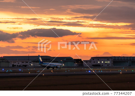 Passenger plane taxing Aso Kumamoto sky 77344207