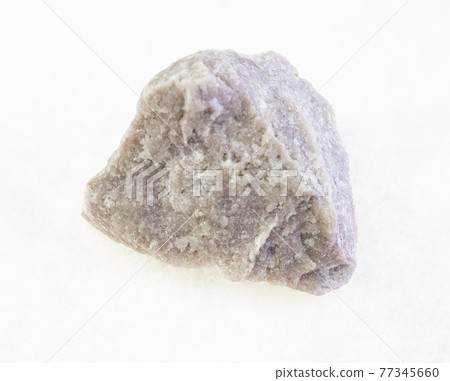 rough dolomite stone on white 77345660