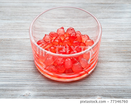 red colored boiled tapioca bubbles in bowl on gray red colored boiled tapioca bubbles in bowl on gray 77346760