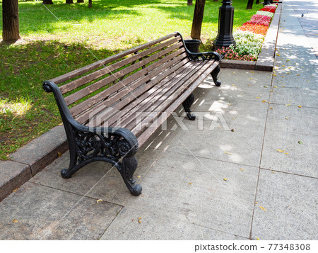 old wooden bench on Nikitsky Boulevard in Moscow old wooden bench on Nikitsky Boulevard in Moscow 77348308