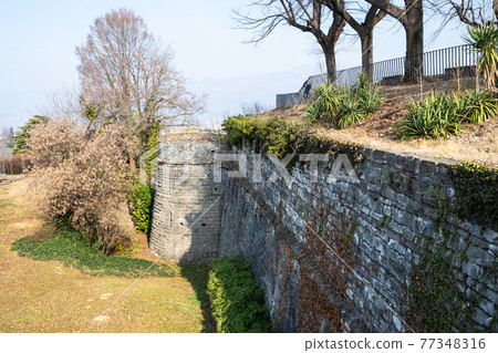 stone wall and tower of Castello di San Vigilio stone wall and tower of Castello di San Vigilio 77348316