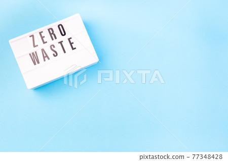 Lightbox with words Zero waste on a blue background, zero waste or plastic free concept, horizontal 77348428
