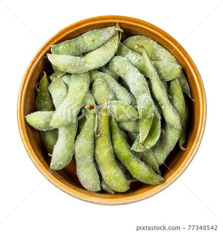 Edamame unripe soybean in pod in round bowl cutout Edamame unripe soybean in pod in round bowl cutout 77348542