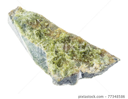 rough Vesuvianite crystals on rock on white 77348586