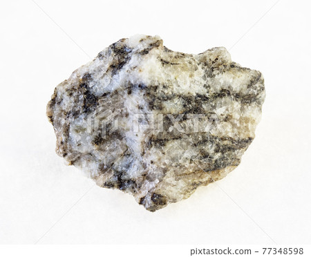 raw gneiss stone on white background raw gneiss stone on white background 77348598