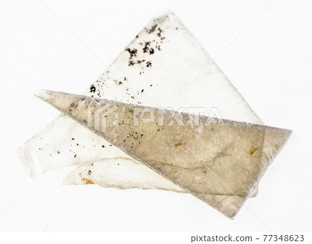 raw muscovite mica (common mica) sheets on white 77348623