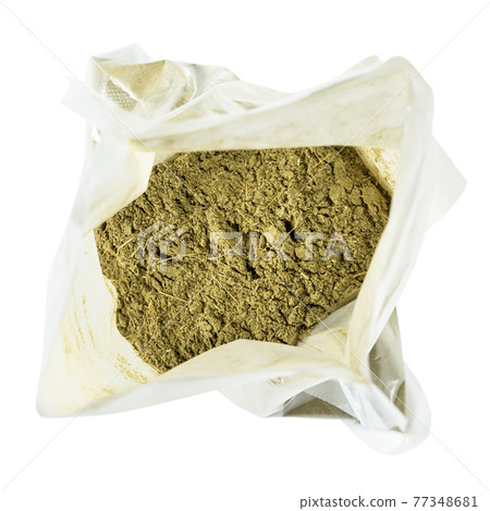 open plastic bag with powder of stevia rebaudiana 77348681