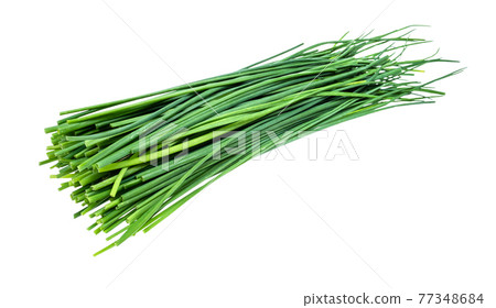 pile of fresh green leaves of chives cutout 77348684