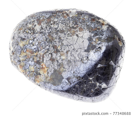 polished Magnetite stone on white polished Magnetite stone on white 77348688