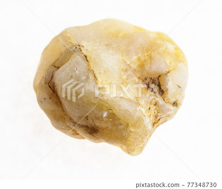 pebble from yellow marble stone on white pebble from yellow marble stone on white 77348730