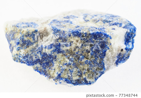 piece of lazurite (lapis lazuli) stone on white 77348744