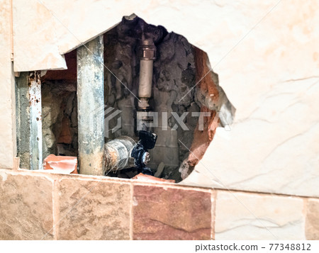 view of old water pipes and closed ball valve view of old water pipes and closed ball valve 77348812