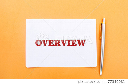 A note with the inscription Overview and a pen. Review, general idea. Business Plan Overview. Business concept. Presentation, report 77350081