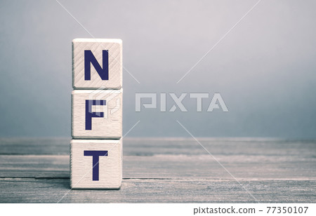 Wooden blocks NFT - non-fungible token. Digitally represented product or asset. Selling digital assets and art through auctions. Blockchain technology. Monetization, investment in cryptographic tokens Wooden blocks NFT - non-fungible token. Digitally represented product or asset. Selling digital assets and art through auctions. Blockchain technology. Monetization, investment in cryptographic tokens 77350107