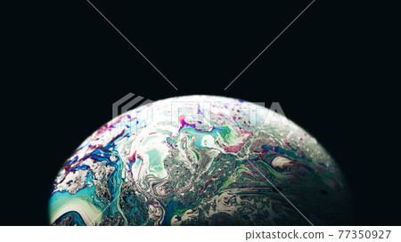 Bubble macro. Abstract galaxy background with globe planet earth in universe space with sunlight on dark background. Macro soap bubble made with dish soap. Bubble macro. Abstract galaxy background with globe planet earth in universe space with sunlight on dark background. Macro soap bubble made with dish soap. 77350927