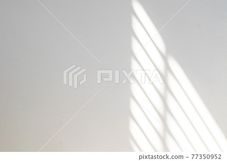Shadows on wall. Abstract light, black shadow overlay from window on white texture wall. Sunlight architecture background. For product presentation, backdrop and mockup, summer seasonal concept. Shadows on wall. Abstract light, black shadow overlay from window on white texture wall. Sunlight architecture background. For product presentation, backdrop and mockup, summer seasonal concept. 77350952
