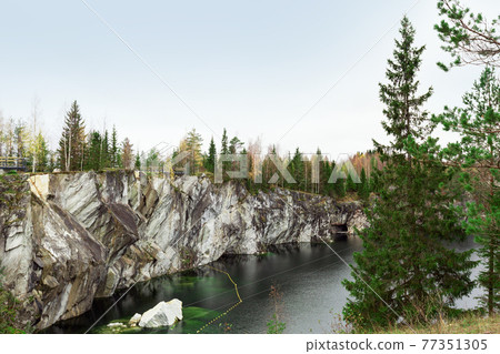 Marble canyon in Mining park Ruskeala at autumn 77351305
