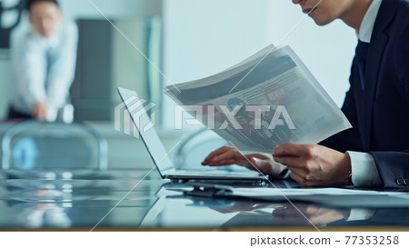 Businessman working Businessman working 77353258