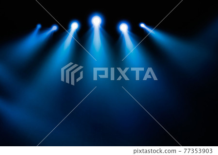 Shining spotlights and empty on stage. Dark gradient black and blue grungy background 77353903