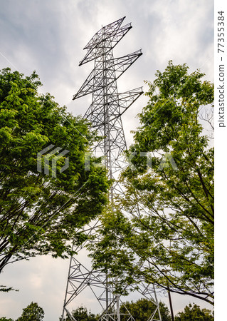 A newly constructed high-voltage power line tower with no electric wires 77355384