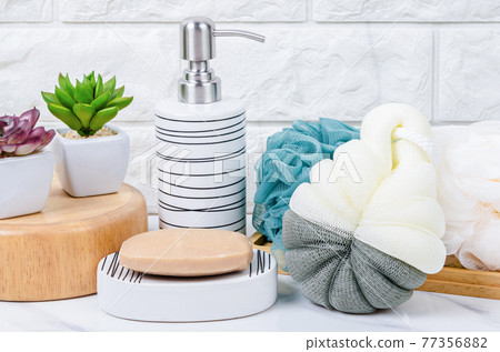 Shower sponge , Herb soap and shampoo pump bottle. 77356882