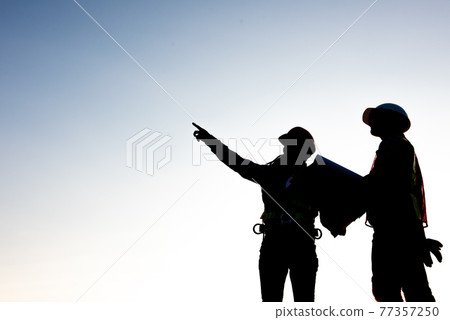 Engineers discussion with architects work planing in construction site 77357250