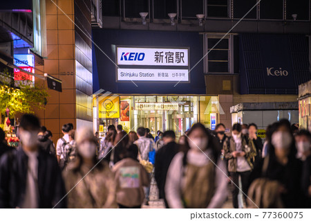 Tokyo cityscape of Japan GW in front of Shinjuku station west exit. The third state of emergency is being declared, but many people = May 4th 77360075