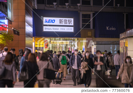 Tokyo cityscape of Japan GW in front of Shinjuku station west exit. The third state of emergency is being declared, but many people = May 4th 77360076