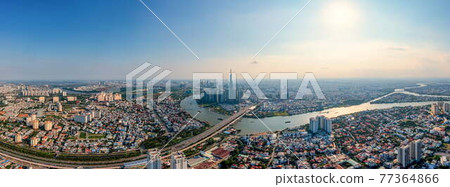 Panorama aerial view of Saigon or Ho Chi Minh city under blue sky Panorama aerial view of Saigon or Ho Chi Minh city under blue sky 77364866