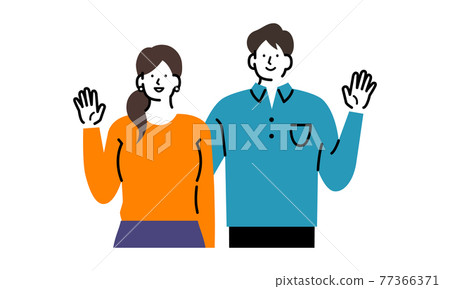 Couple raising their hands 77366371