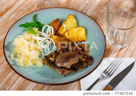 Appetizing fried rabbit liver with vegetables Appetizing fried rabbit liver with vegetables 77367330