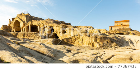 Ancient cave city of Uplistsikhe with active basilica, Georgia 77367435
