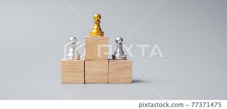 top of golden chess pawn pieces or leader businessman. victory, leadership, business success, team, recruiting, and teamwork concept top of golden chess pawn pieces or leader businessman. victory, leadership, business success, team, recruiting, and teamwork concept 77371475