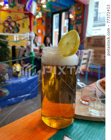 Beer in mason jar. Beverage served in Mexican cafe 77372413