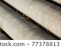 Gray stone pipes for water drains, urban repair work 77378813