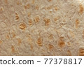 Fried tortilla, top view, texture of baked pastry, close-up 77378817