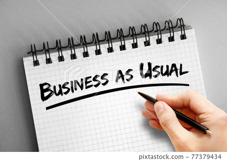 Business as Usual text on notepad, business concept background Business as Usual text on notepad, business concept background 77379434