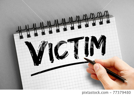 Victim text on notepad, concept background Victim text on notepad, concept background 77379480